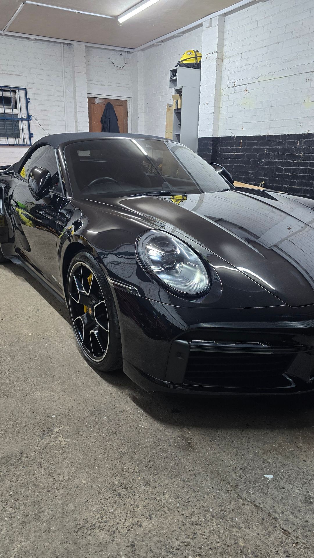 Black porsche 911 being detailed at MJ's Detailing Birmingham 